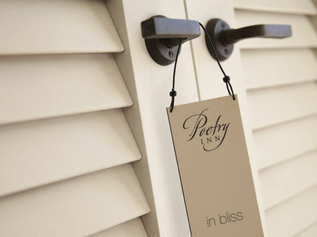 Poetry Inn in bliss spa door hanger